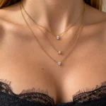 Colier Layered Star Drop Heart Gold placat cu Aur 16K purtat la gât pentru femei